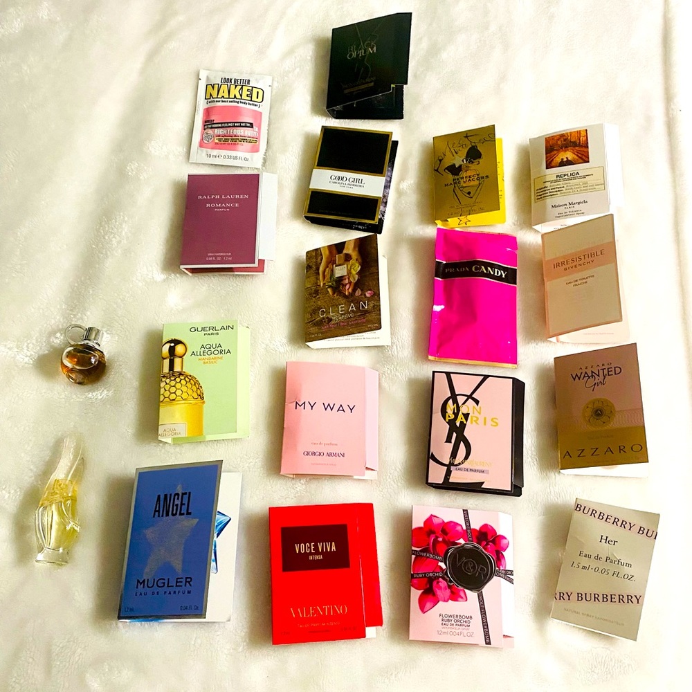 Lot of 18 perfume samples.Sprayed once.Travel size bottles, 50% left in each